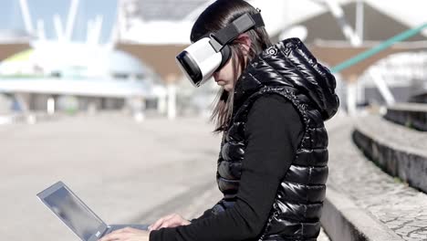 Woman-in-VR-headset-using-laptop